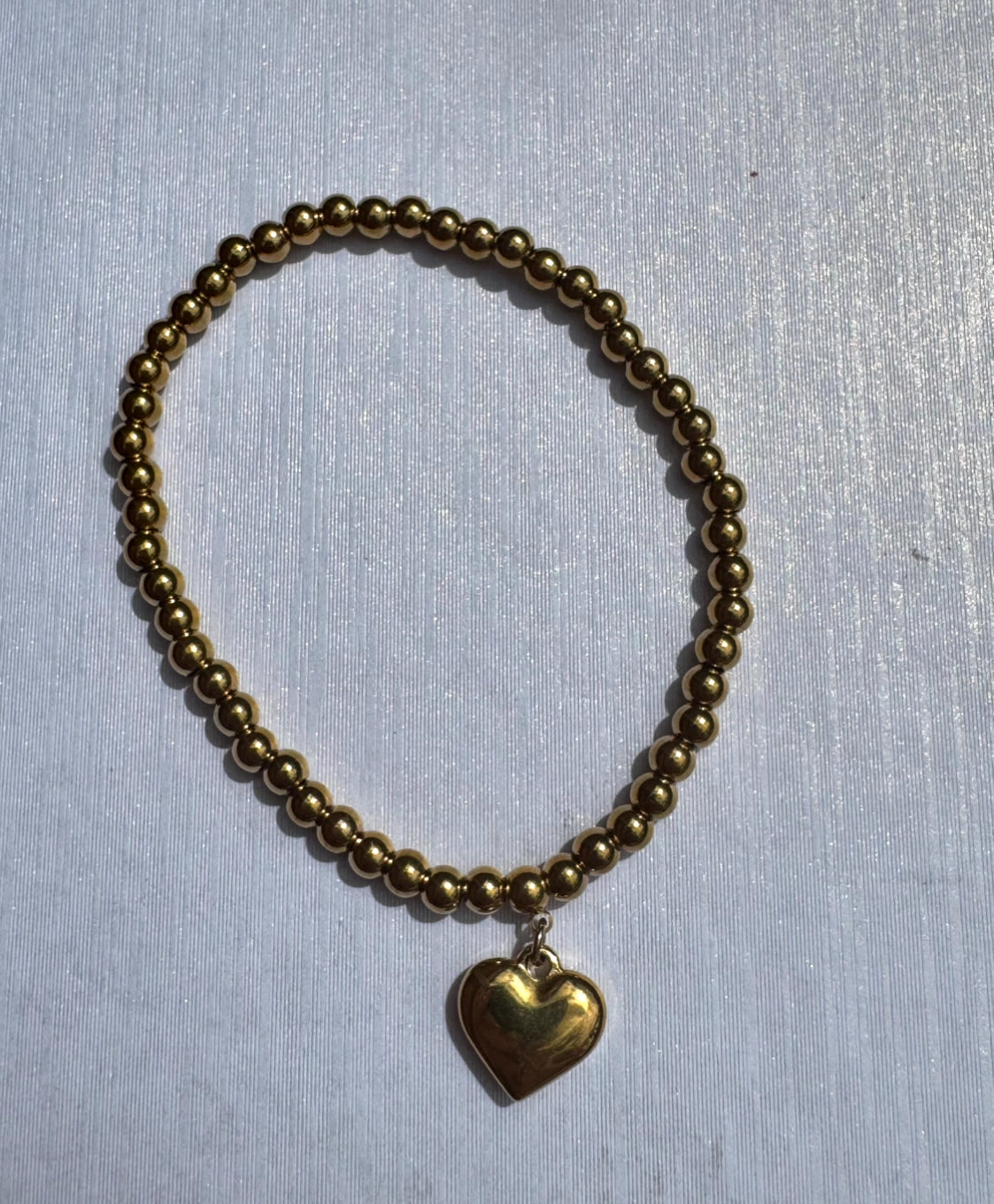 Gold beaded bracelet - various designs