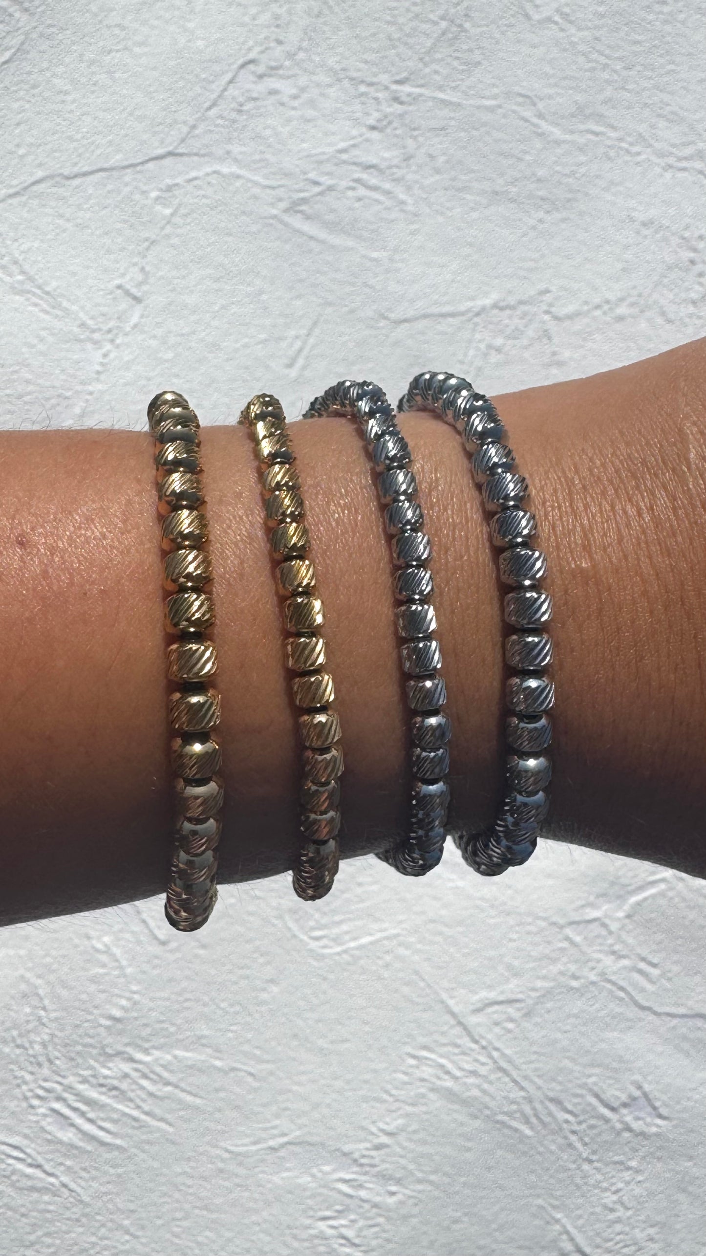 Solid beaded elasticated bracelets 