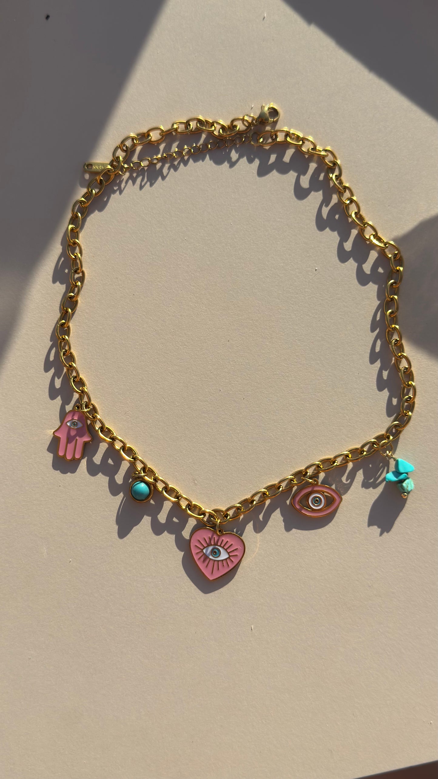 Evil eye pink charm necklace