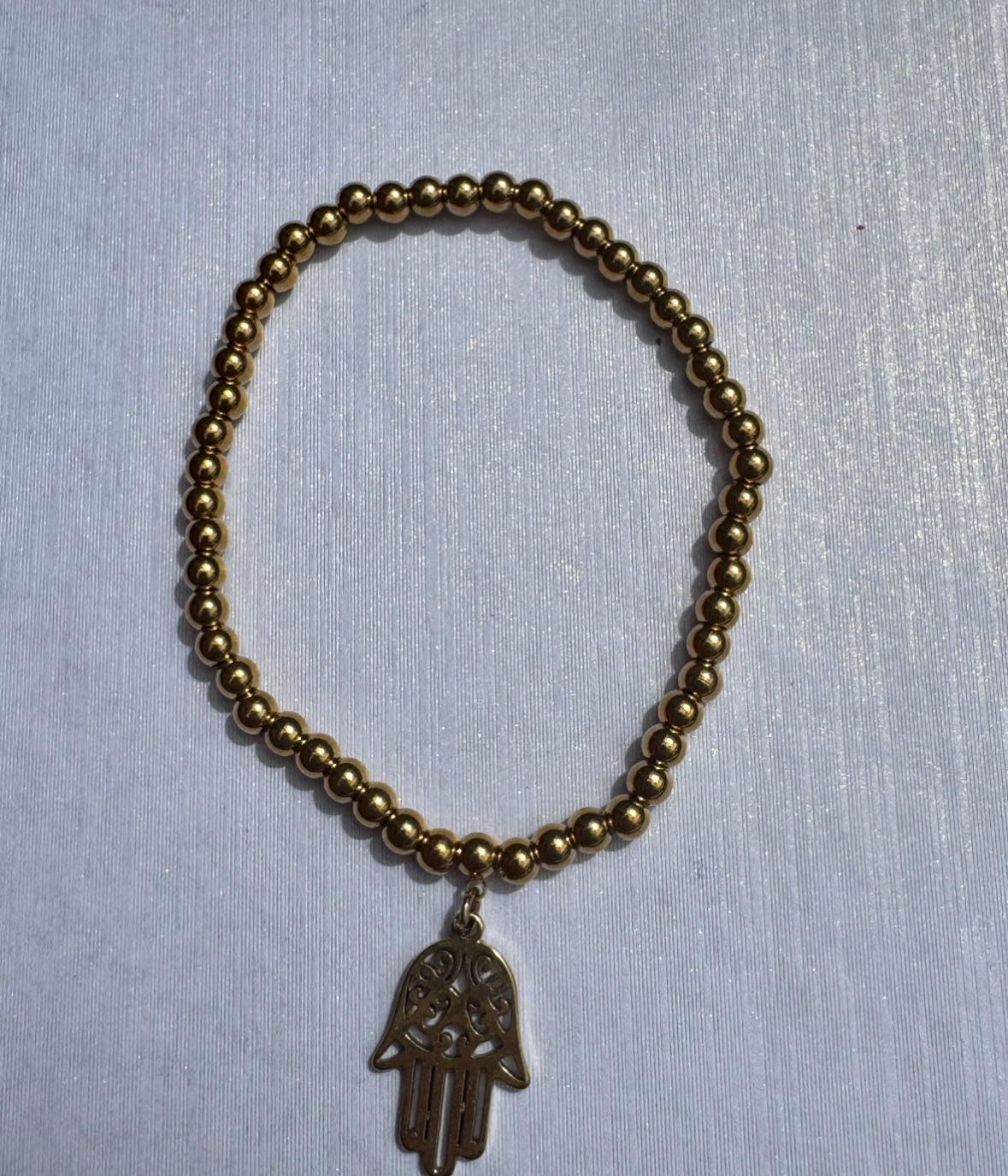 Gold beaded bracelet - various designs