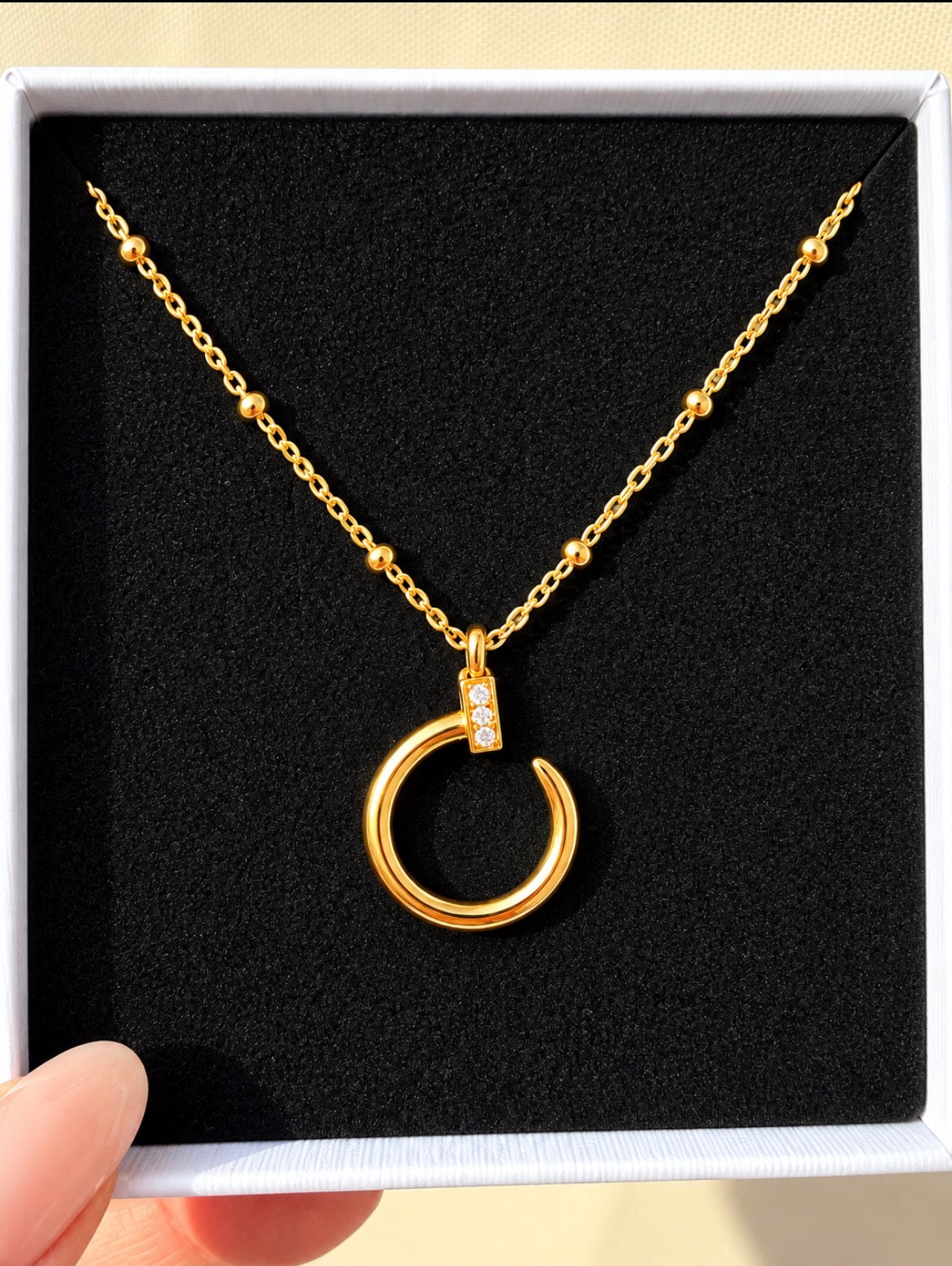 Amara Gold Nail Necklace