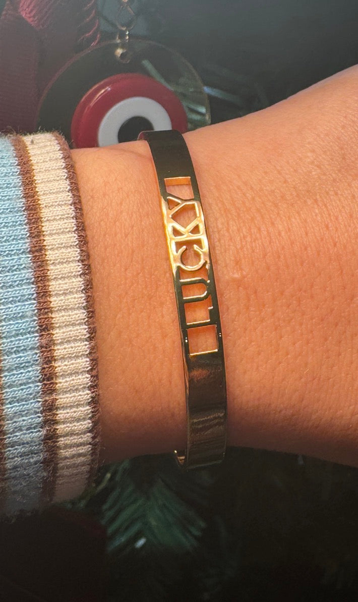 Lucky gold bangle